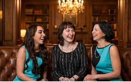 Three women in turquoise dresses