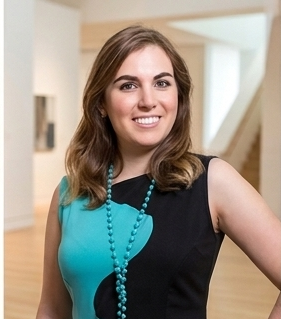 Woman in black and turquoise dress